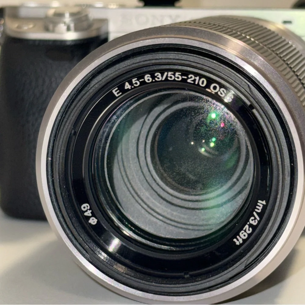 Sony a6000 - 24.3 MP Mirrorless Camera Body & 55‑210mm OSS Lens - Silver